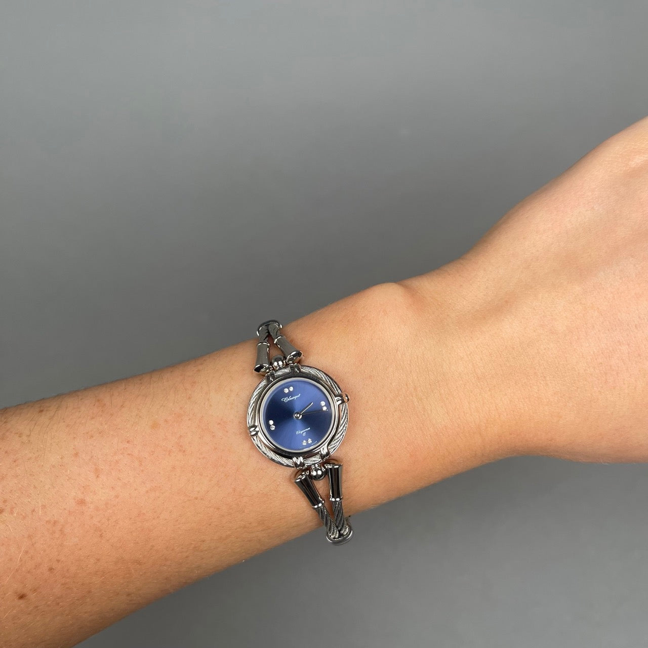 Case Rhodium Plated Stainless Steel Dial Blue Dial Stone Half Bangle